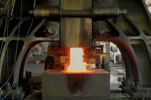 Custom forging press working hot metal
